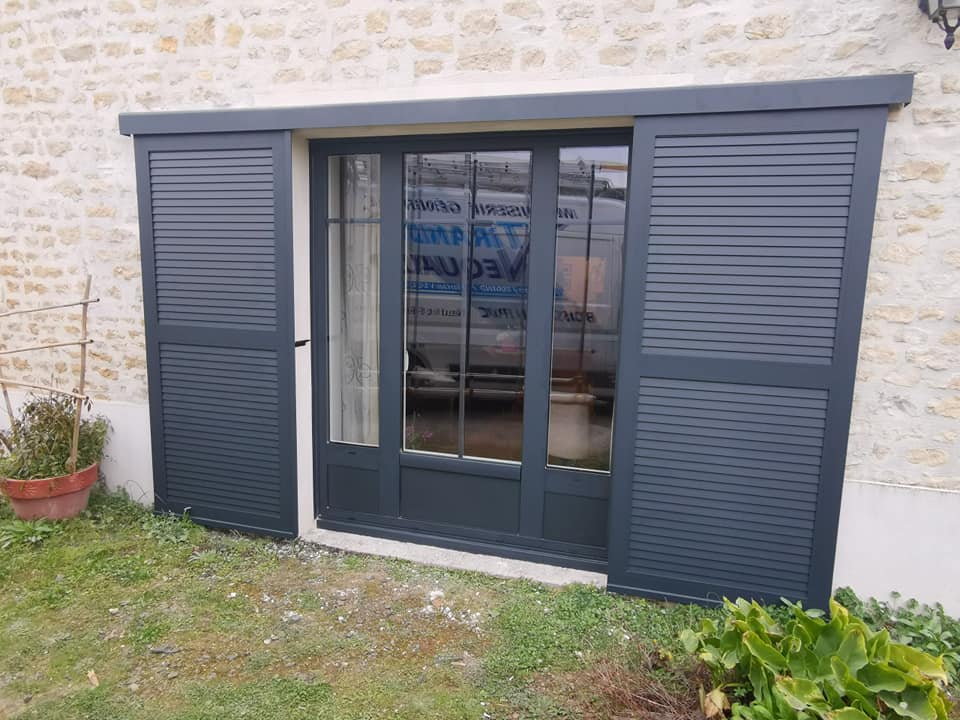 Volets coulissants pour porte fenetre